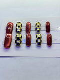 Red cat eyed and checkered press on nails.