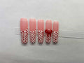 White tipped, red polka dots.